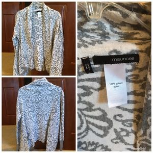 Grey and white sweater.